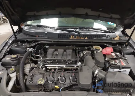 2015 Ford Taurus Sel z USA, uszkodzony, nr VIN 1FAHP2E80FG101683